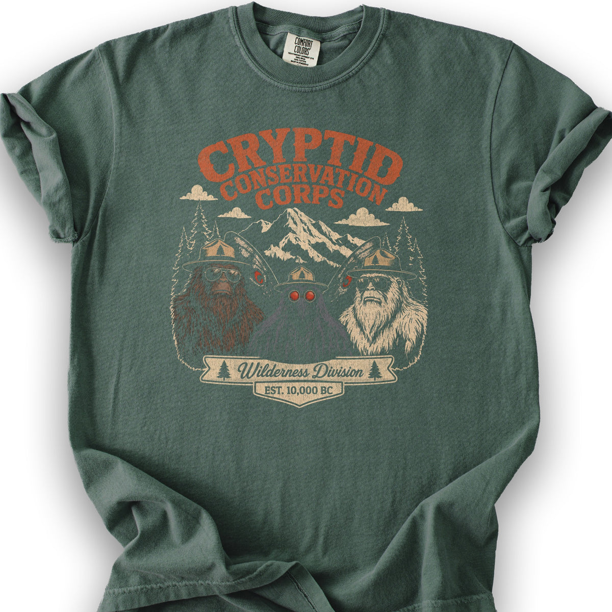 Cryptid Conservation Corps T-Shirt - Blue Spruce